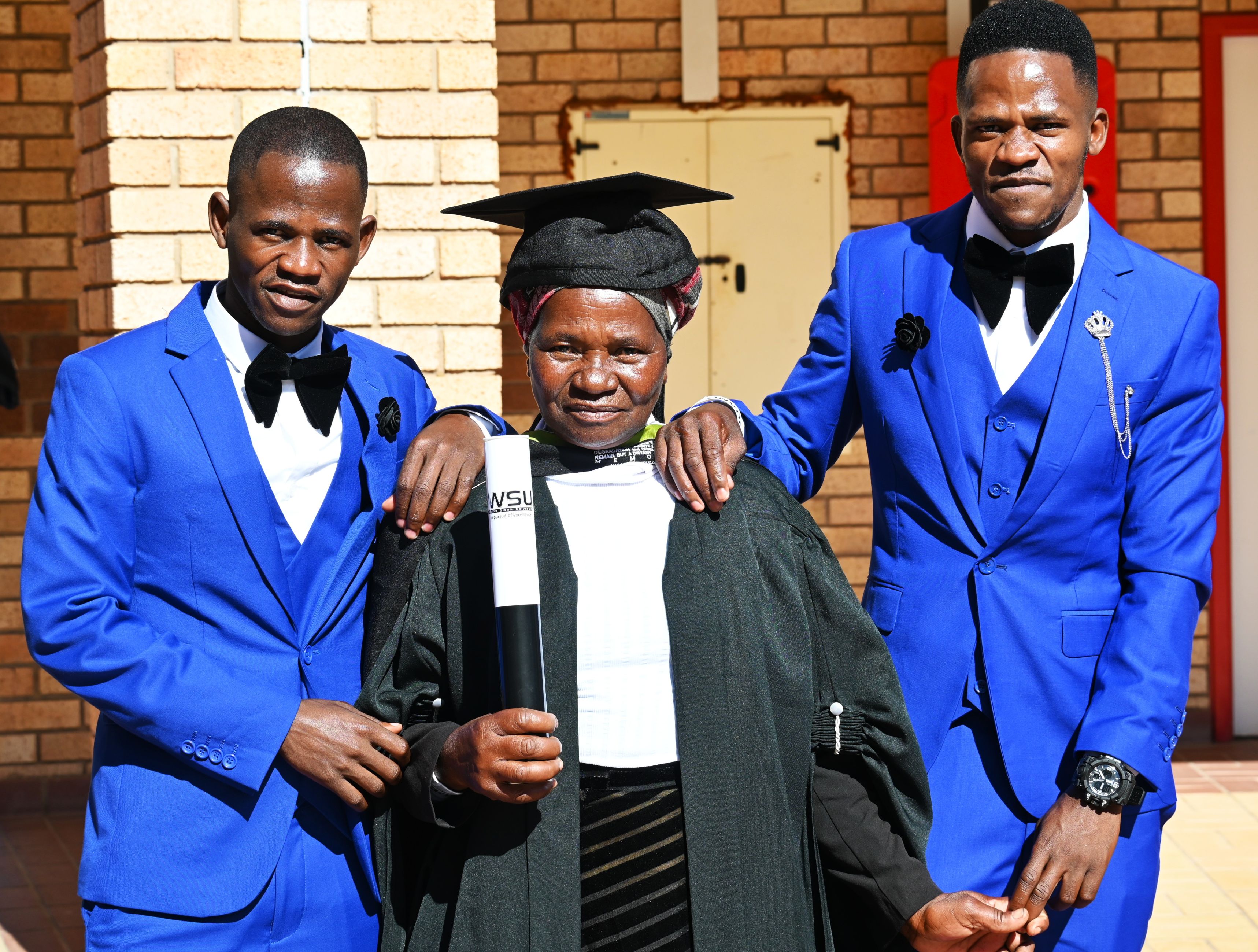 TWIN_BROTHERS_PAY_BACK_MOTHERS_HARD_WORK_BY_GRADUATING_A_DAY_APART.JPG