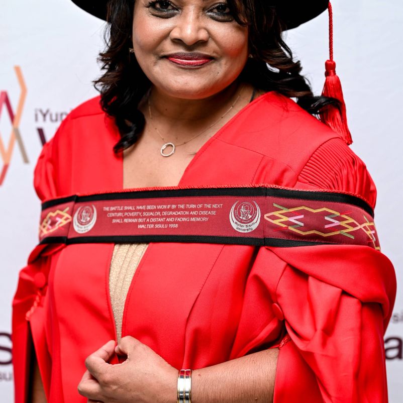 FACULTY ADMINISTRATOR TRUIMPHS WITH PhD ACHIEVEMENT